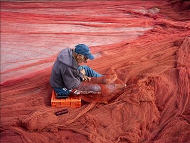 Fishermen continue their daily work at the port in the city of Essaouira, Morocco.