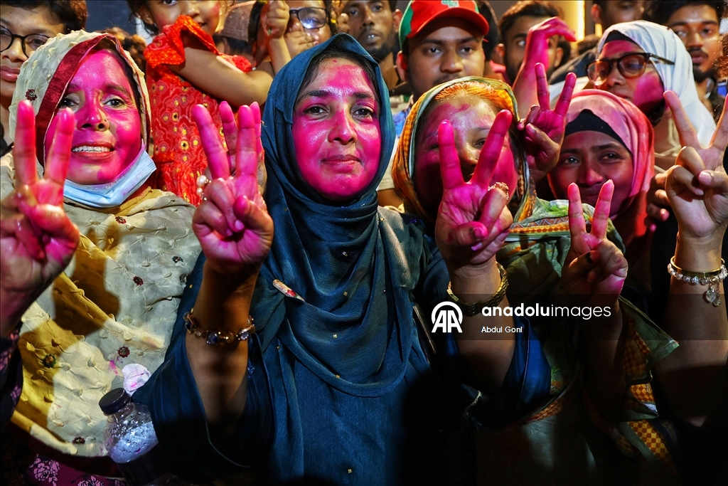 Supporters of Bangladesh Nationalist Party celebrate following unofficial election victory