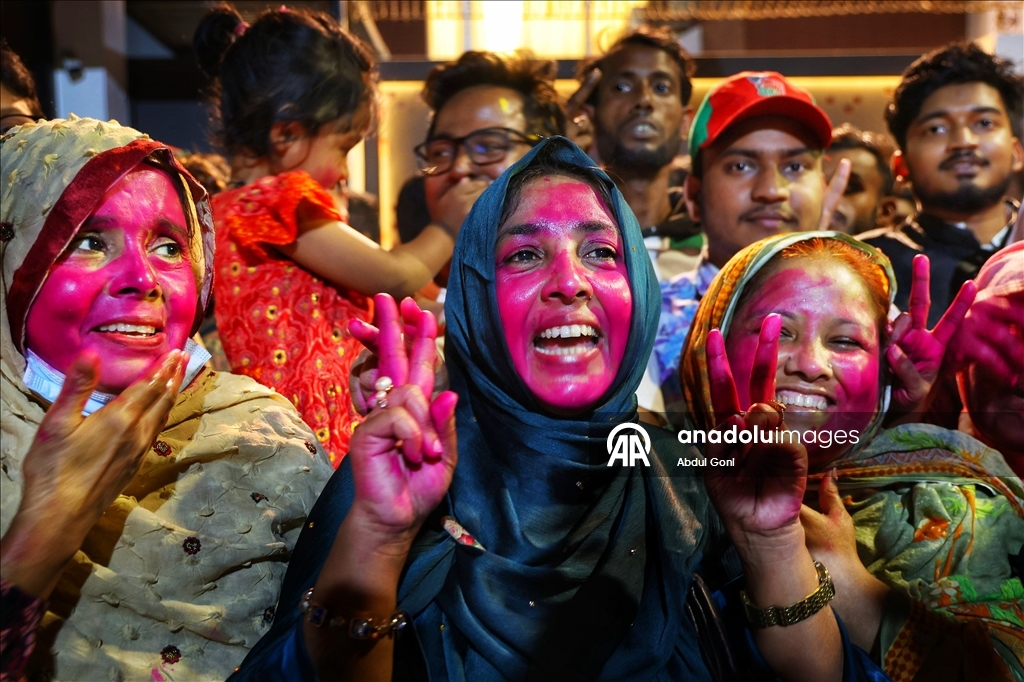 Supporters of Bangladesh Nationalist Party celebrate following unofficial election victory