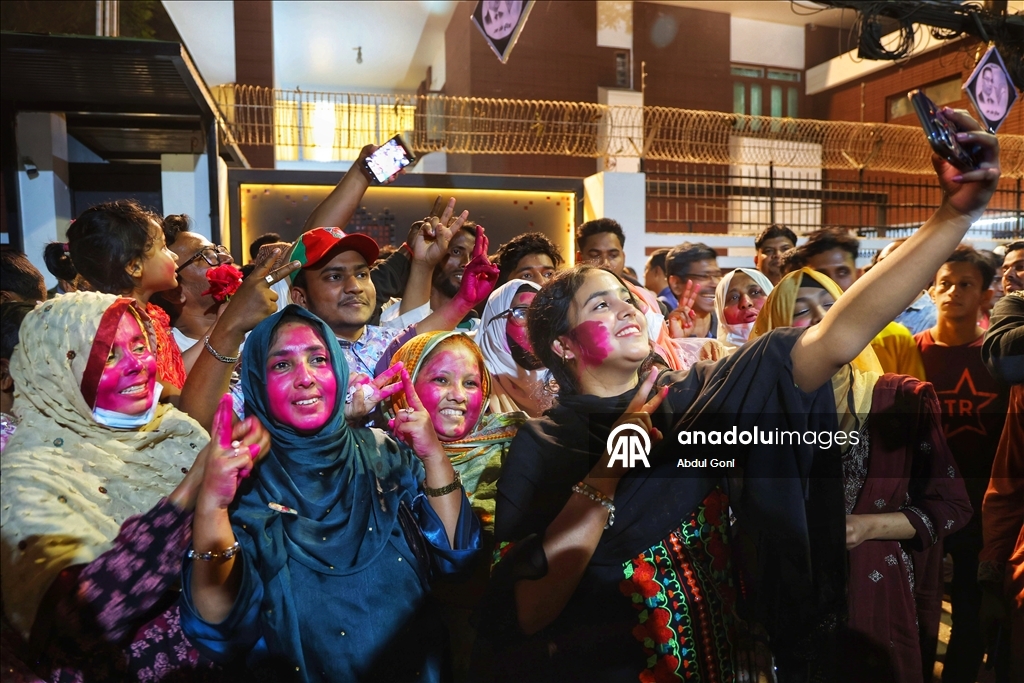Supporters of Bangladesh Nationalist Party celebrate following unofficial election victory