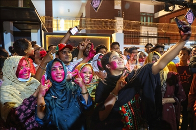 Supporters of Bangladesh Nationalist Party celebrate following unofficial election victory