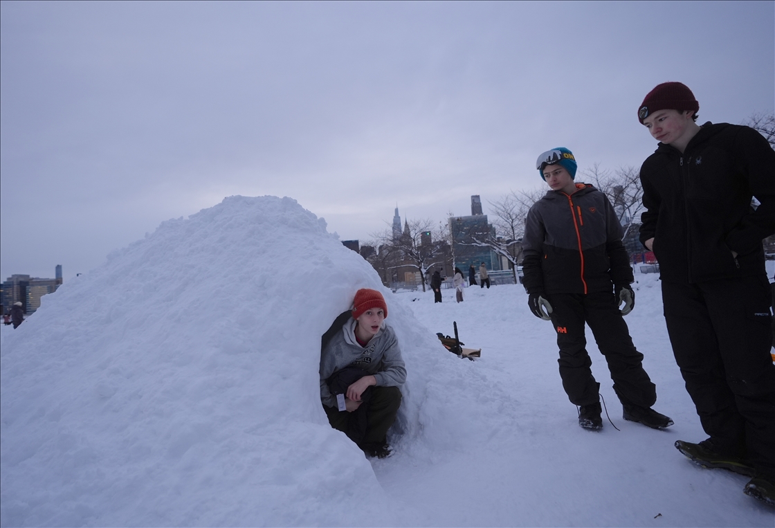 People in New York City enjoy the snow after a major snowstorm hits the city