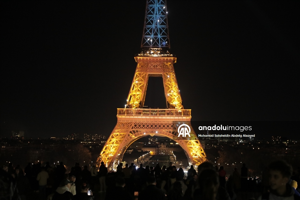 Eiffel Tower is illuminated in Ukrainian flag colors