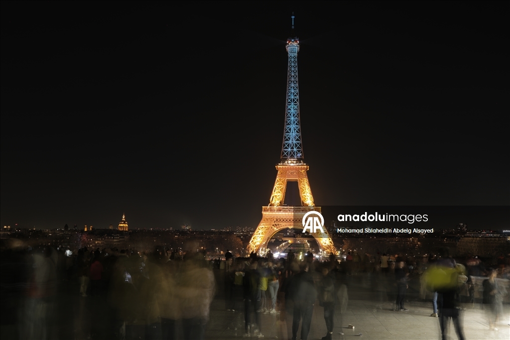 Eiffel Tower is illuminated in Ukrainian flag colors