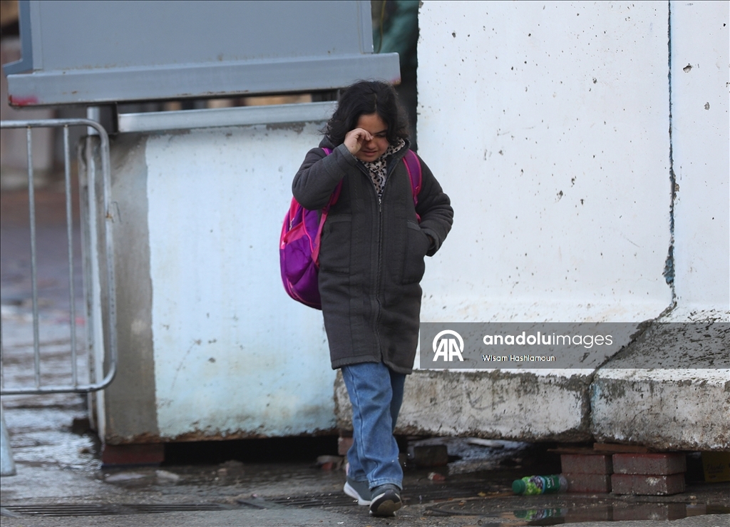 Palestinians cross from Bethlehem to Jerusalem for the second Friday prayer of Ramadan