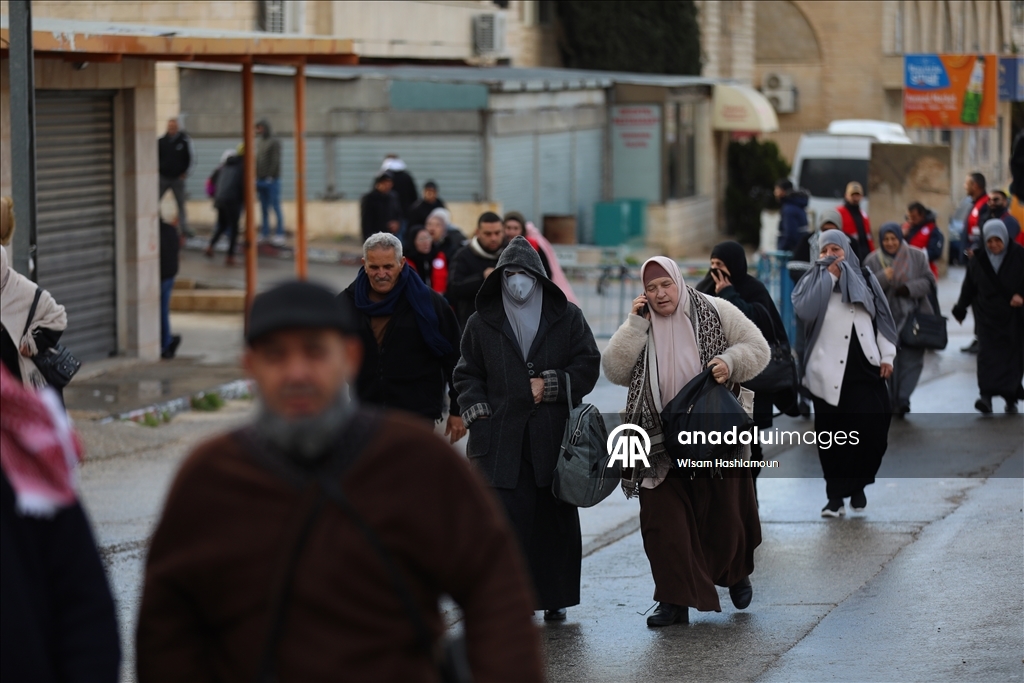 Palestinians cross from Bethlehem to Jerusalem for the second Friday prayer of Ramadan