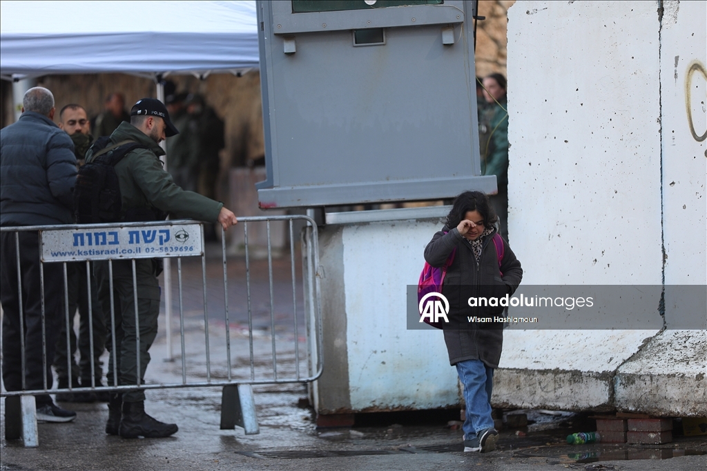 Palestinians cross from Bethlehem to Jerusalem for the second Friday prayer of Ramadan
