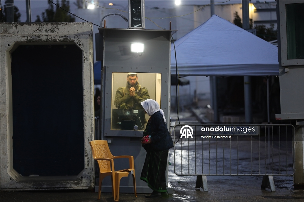 Palestinians cross from Bethlehem to Jerusalem for the second Friday prayer of Ramadan