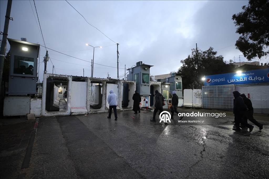 Palestinians cross from Bethlehem to Jerusalem for the second Friday prayer of Ramadan