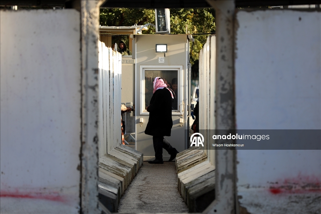 Palestinians cross from Bethlehem to Jerusalem for the second Friday prayer of Ramadan