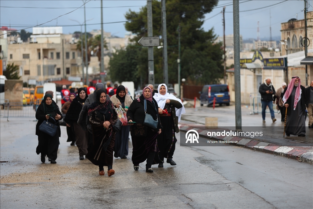 Palestinians cross from Bethlehem to Jerusalem for the second Friday prayer of Ramadan