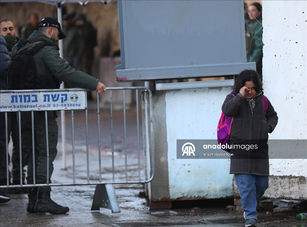 Palestinians cross from Bethlehem to Jerusalem for the second Friday prayer of Ramadan