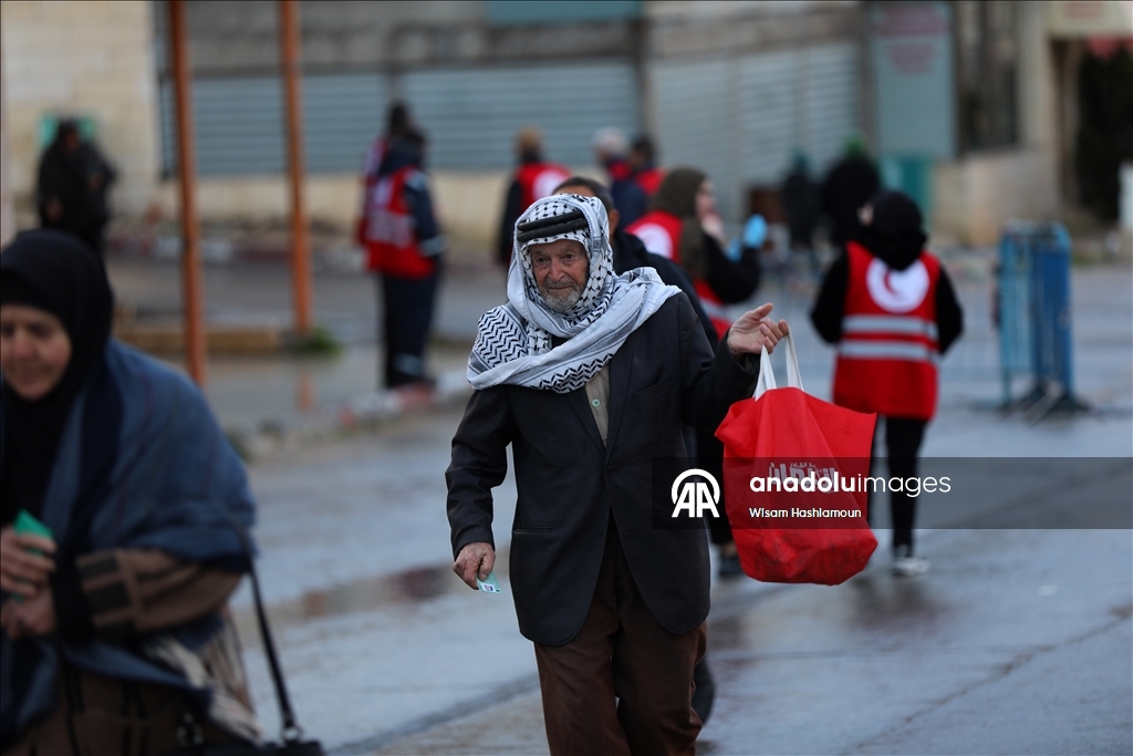 Palestinians cross from Bethlehem to Jerusalem for the second Friday prayer of Ramadan