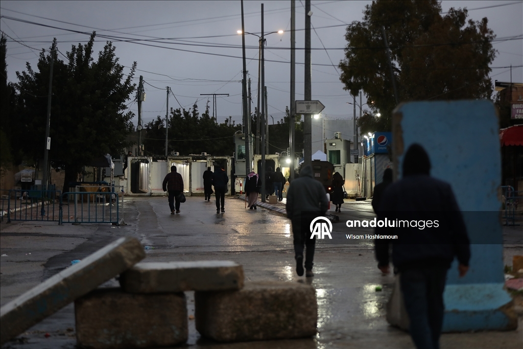 Palestinians cross from Bethlehem to Jerusalem for the second Friday prayer of Ramadan
