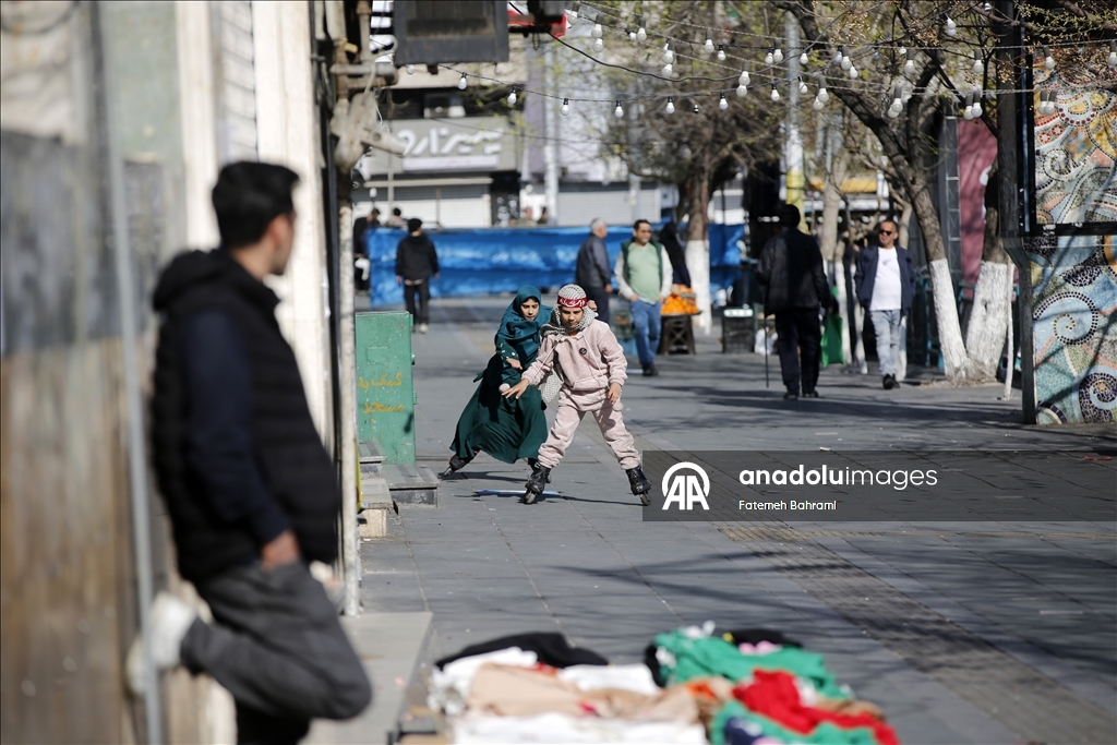 İsrail ve ABD'nin İran'a yönelik ortak saldırıları gölgesinde başkent Tahran'da hayat devam ediyor