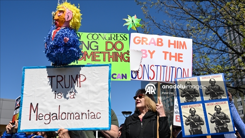 В США прошли многотысячные протесты против политики Трампа 40