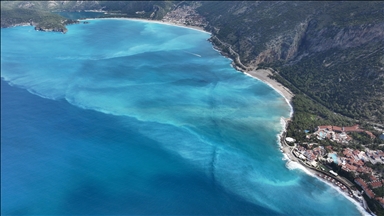 Fethiye'de sağanak sonrası Ölüdeniz turkuaz renge büründü