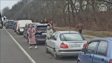Long queues of vehicles were seen along Poland border as civilians flee ...
