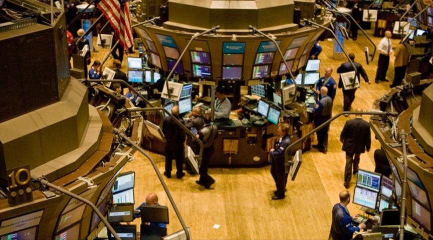 Wall Street closes lower as US withdraws from TPP