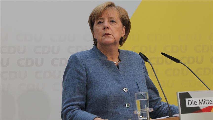 SPD congress backs coalition talks with Merkel