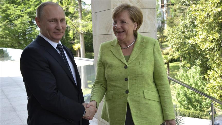 Russia's Putin, Germany's Merkel discuss Iran deal