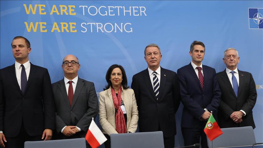 BRUSSELS, BELGIUM - OCTOBER 03: Turkish National Defense Minister Hulusi Akar (3rd R) attends a signing ceremony of declaration of intent to cooperate on the introduction of Maritime Unmanned Systems within the NATO Defense Ministers meeting in Brussels, Belgium on October 03, 2018. ( Arif Akdoğan - Anadolu Agency )