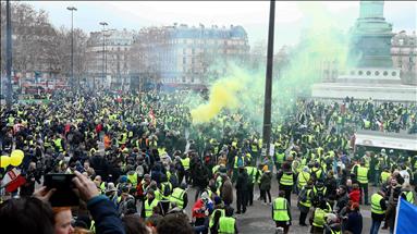 Macron launches national debate to quell French anger