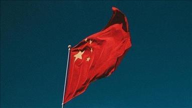 Oil prices down as China lowers growth forecast