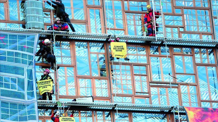 Climate activists protest new plans amid EU summit