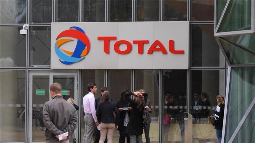 Total's revenue down 52%, net loss $8.3B in Q2