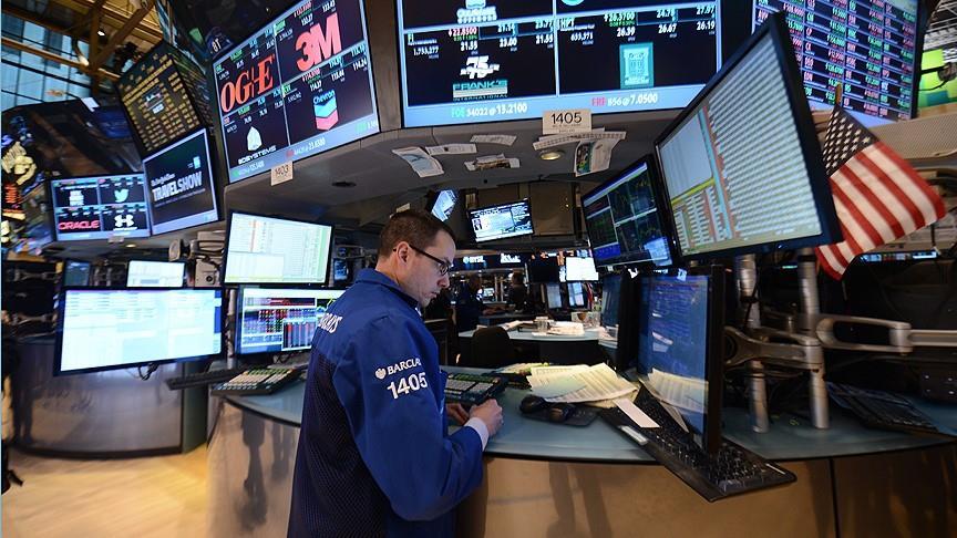 US stocks higher as volatility falls, dollar rises