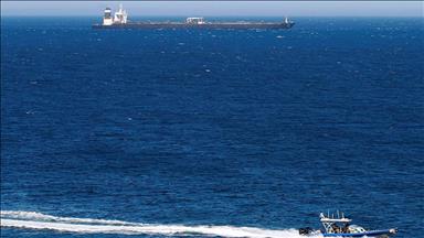 Cargo ship beached in Gibraltar bay after collision, authorities prepare for oil spill