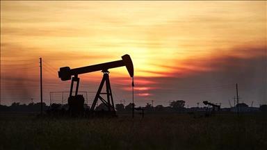 Oil up with demand boost from weak US dollar