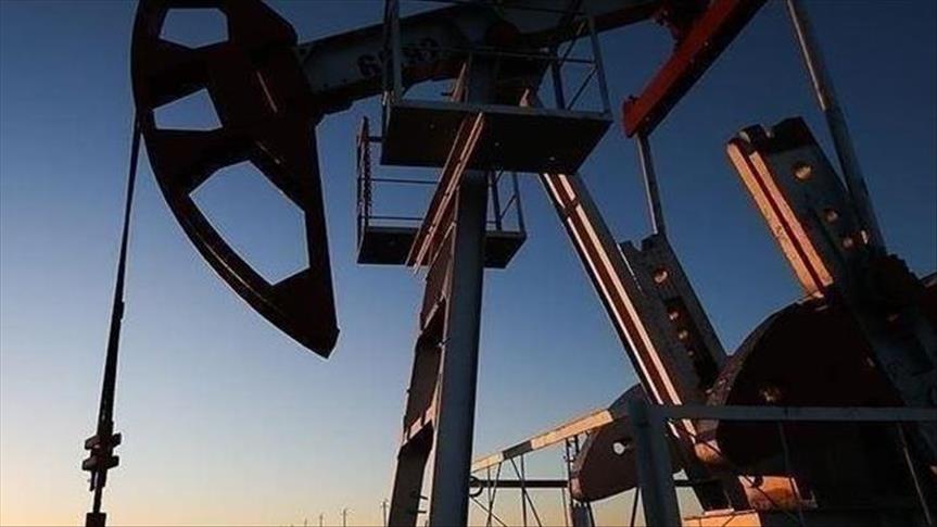 Price slump wipes out over $24 billion of first-half profits for oil giants