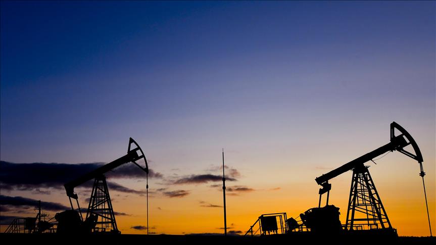 Oil prices edge higher on US crude draw