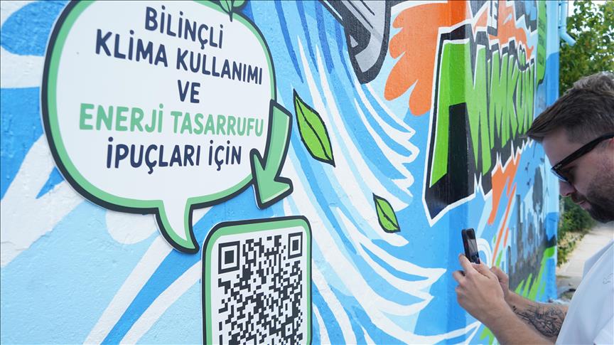 UEDAŞ'tan trafo duvarına klima kullanımında 24 dereceyi öneren grafiti çalışması